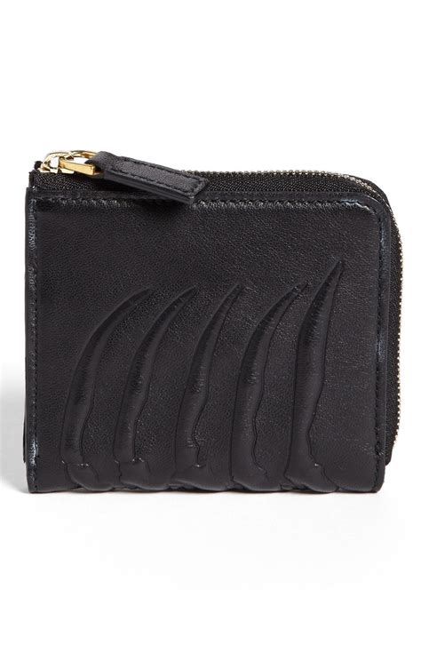 alexander mcqueen rib cage wallet.